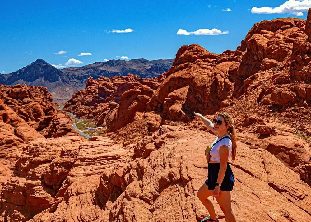 View over red sandstone ridges and the park road on the drive to Valley of Fire from Las Vegas, Nevada